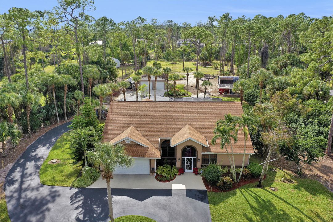 5980 Hidden Oaks Ln, Naples, FL 34119