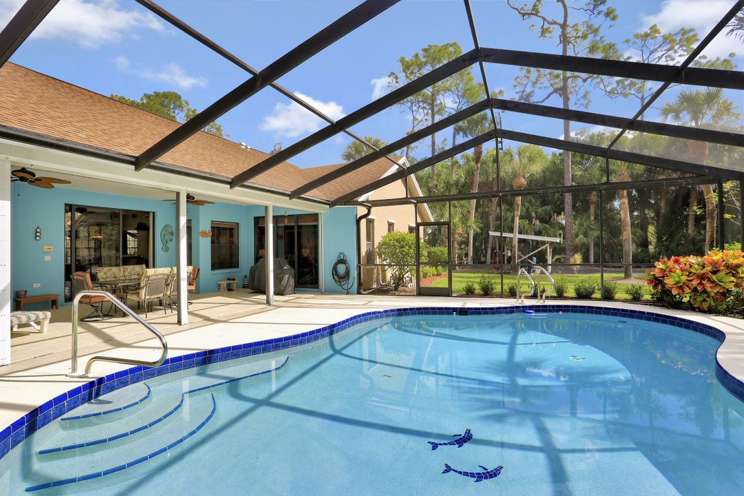 5980 Hidden Oaks Ln, Naples, FL 34119