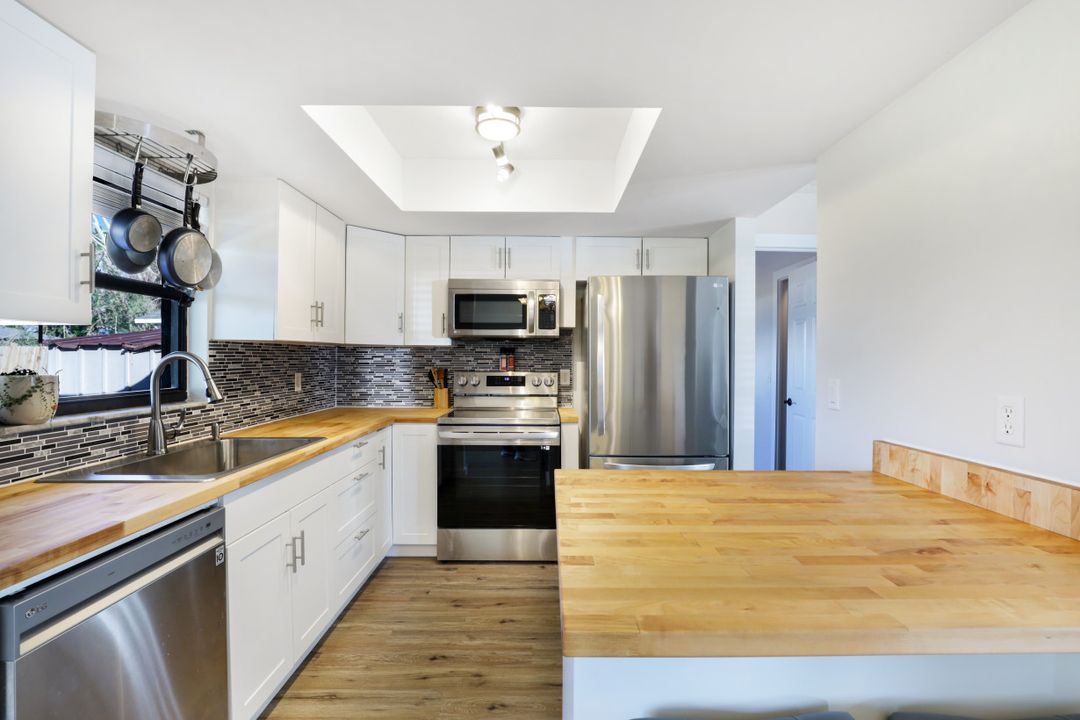 1303 SE 14th Terrace, Cape Coral, FL 33990