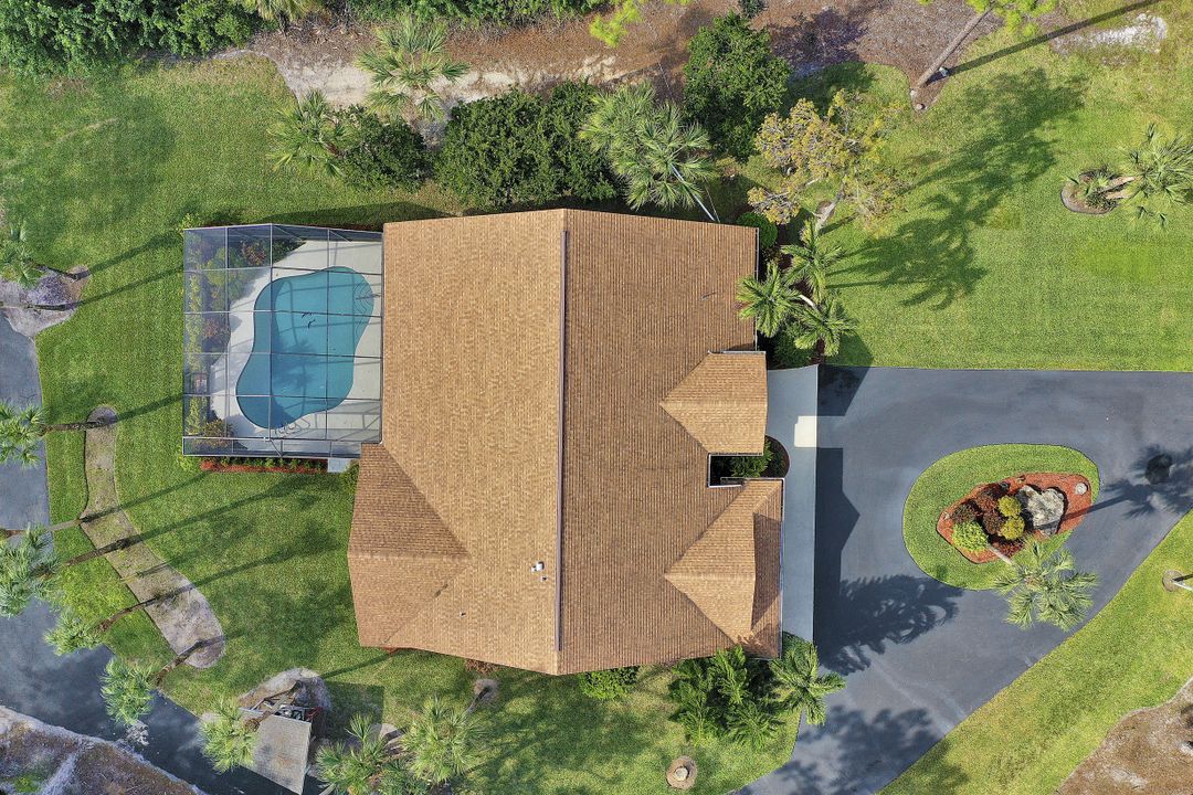 5980 Hidden Oaks Ln, Naples, FL 34119