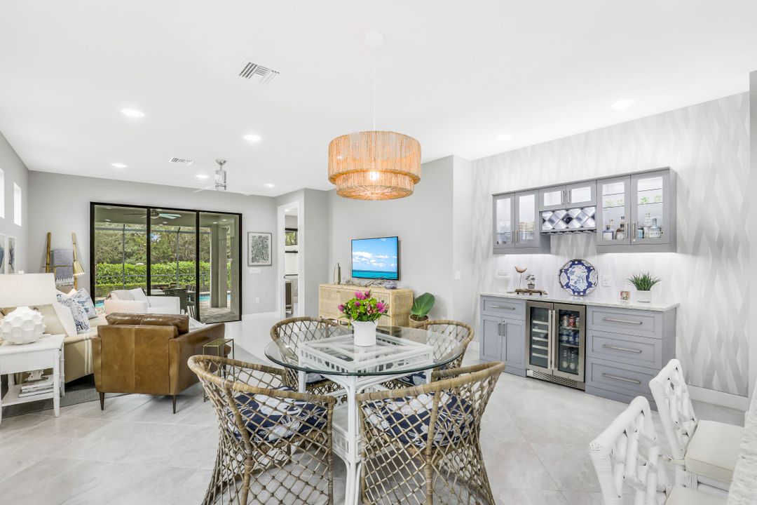 7682 Jacaranda Ln, Naples, FL 34114