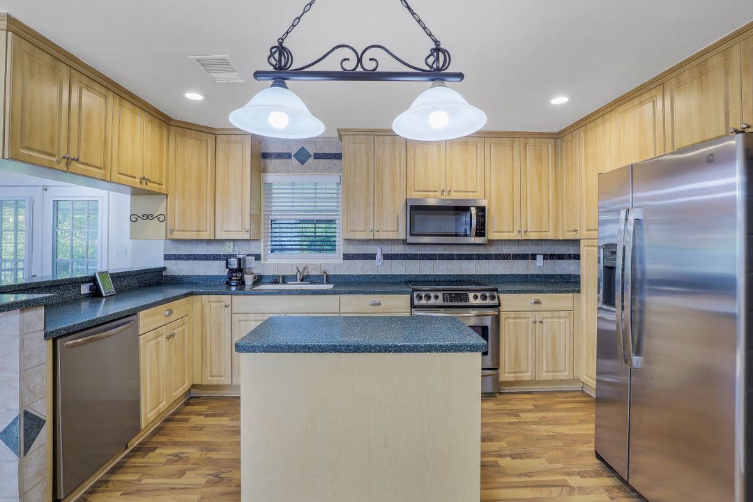 8642 Whispering Pines Dr, Saint James City, FL 33956