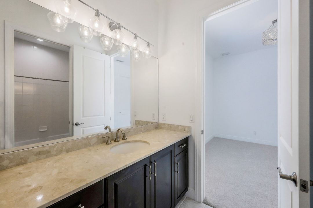 4098 Raffia Dr, Naples, FL 34119