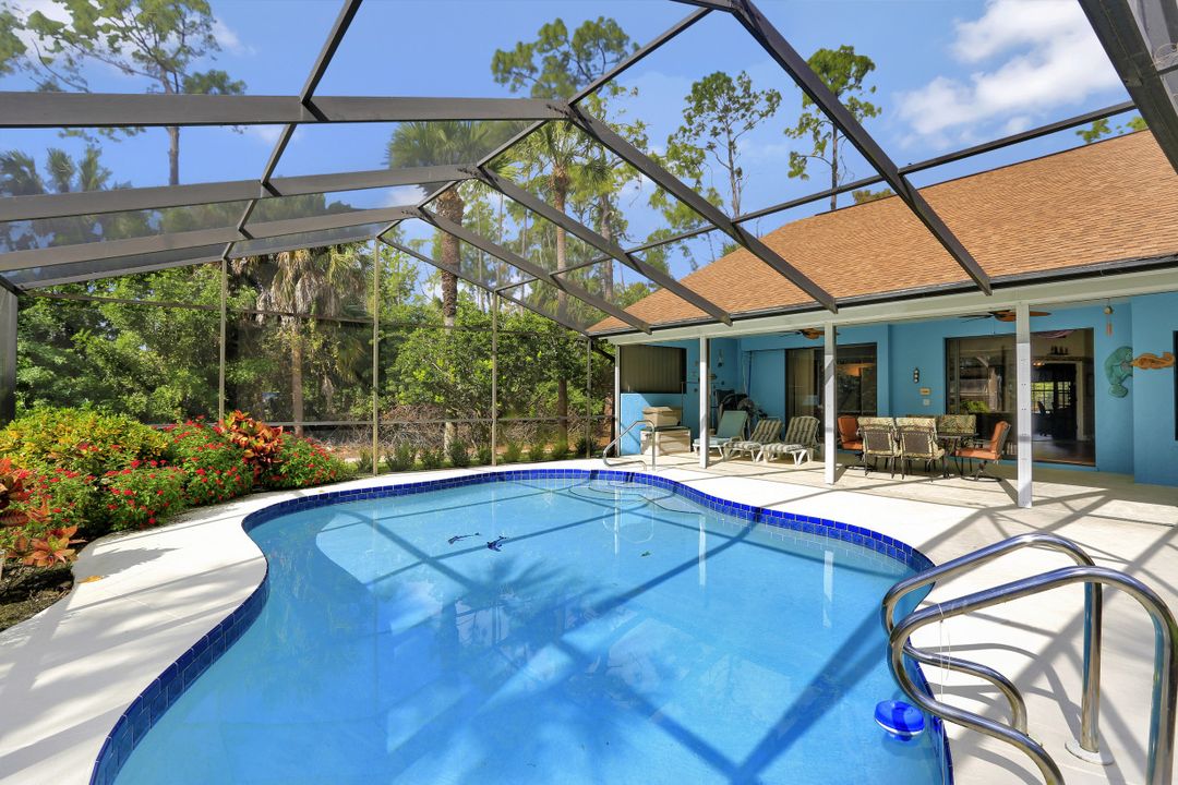 5980 Hidden Oaks Ln, Naples, FL 34119