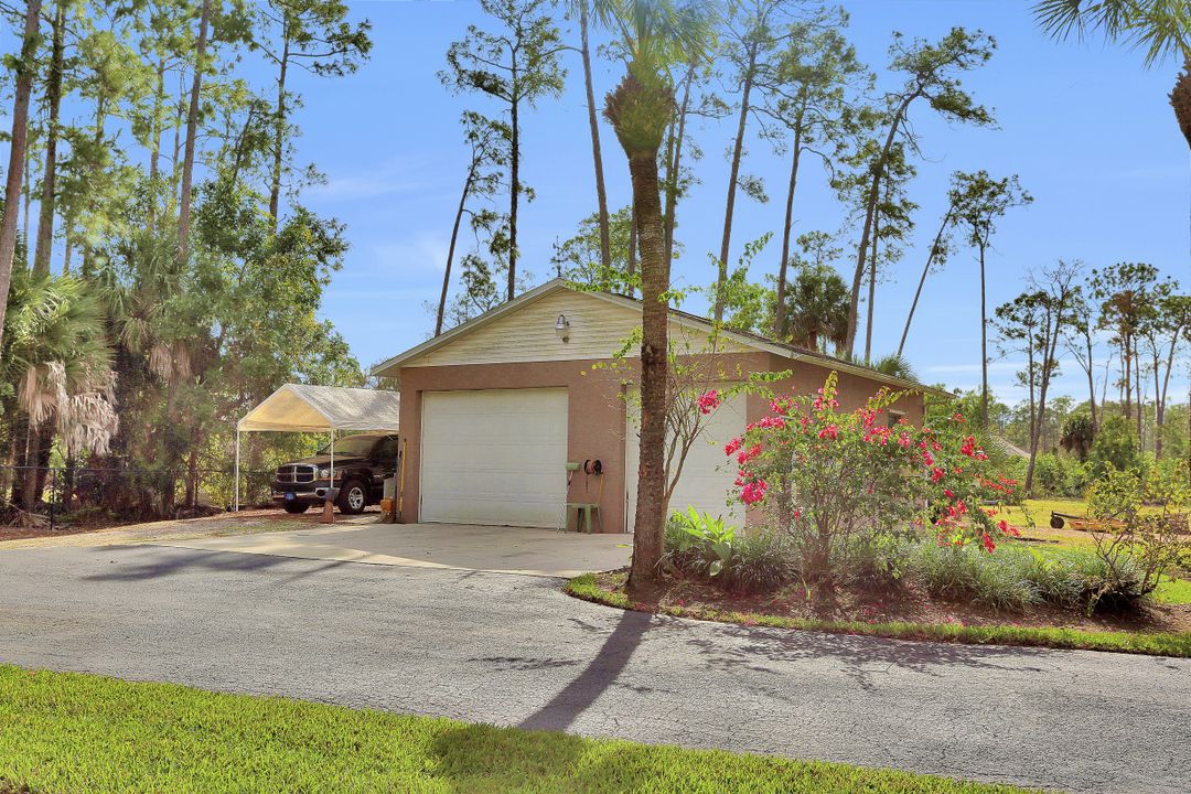 5980 Hidden Oaks Ln, Naples, FL 34119