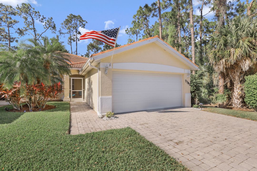 7782 Berkshire Pines Dr, Naples, FL 34104