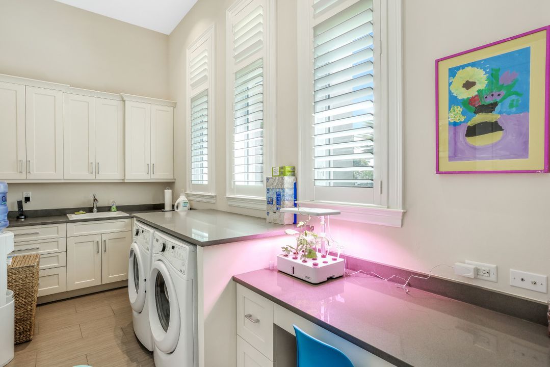 569 Neapolitan Way, Naples, FL 34103