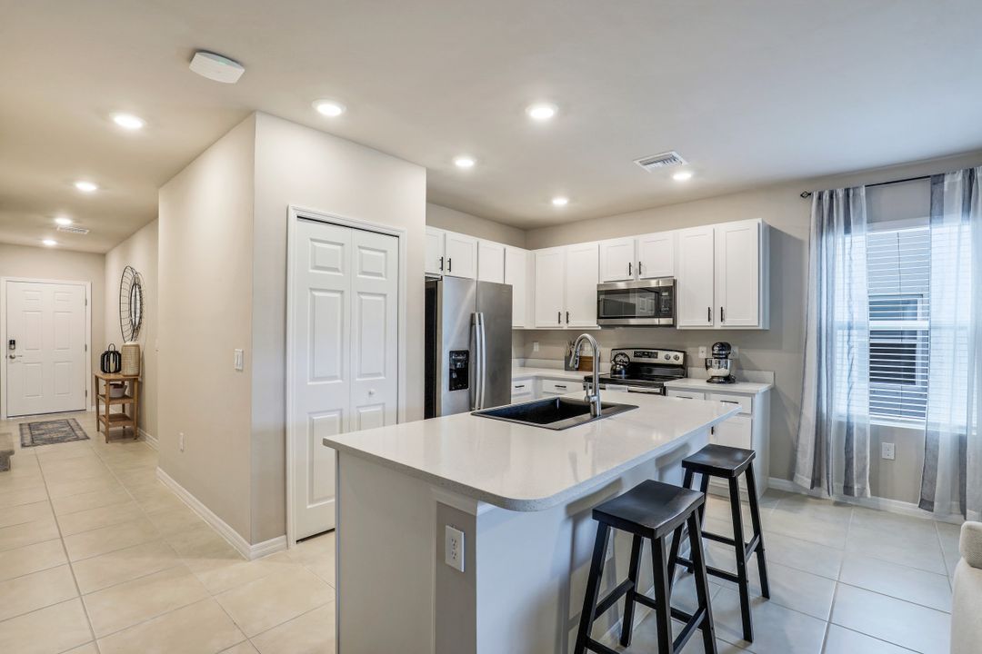 15365 Wildflower Cir, Naples, FL 34119