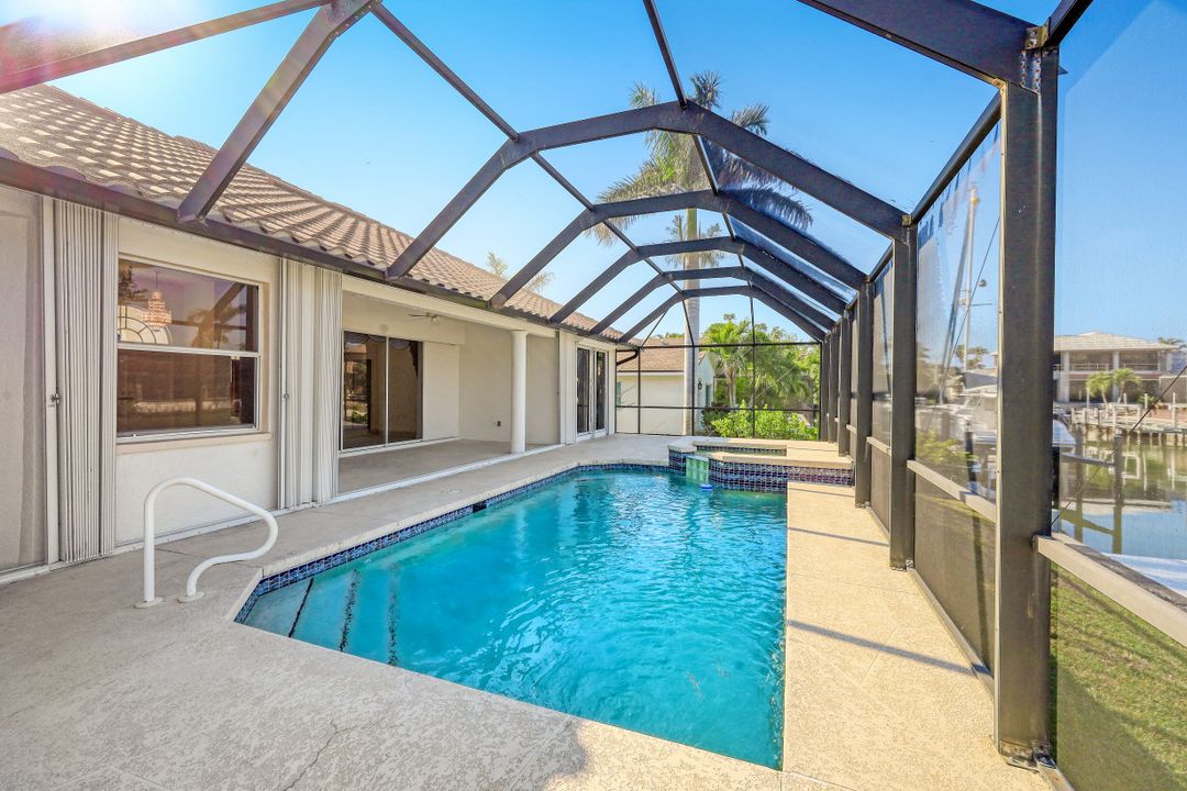 718 Nautilus Ct, Marco Island, FL 34145