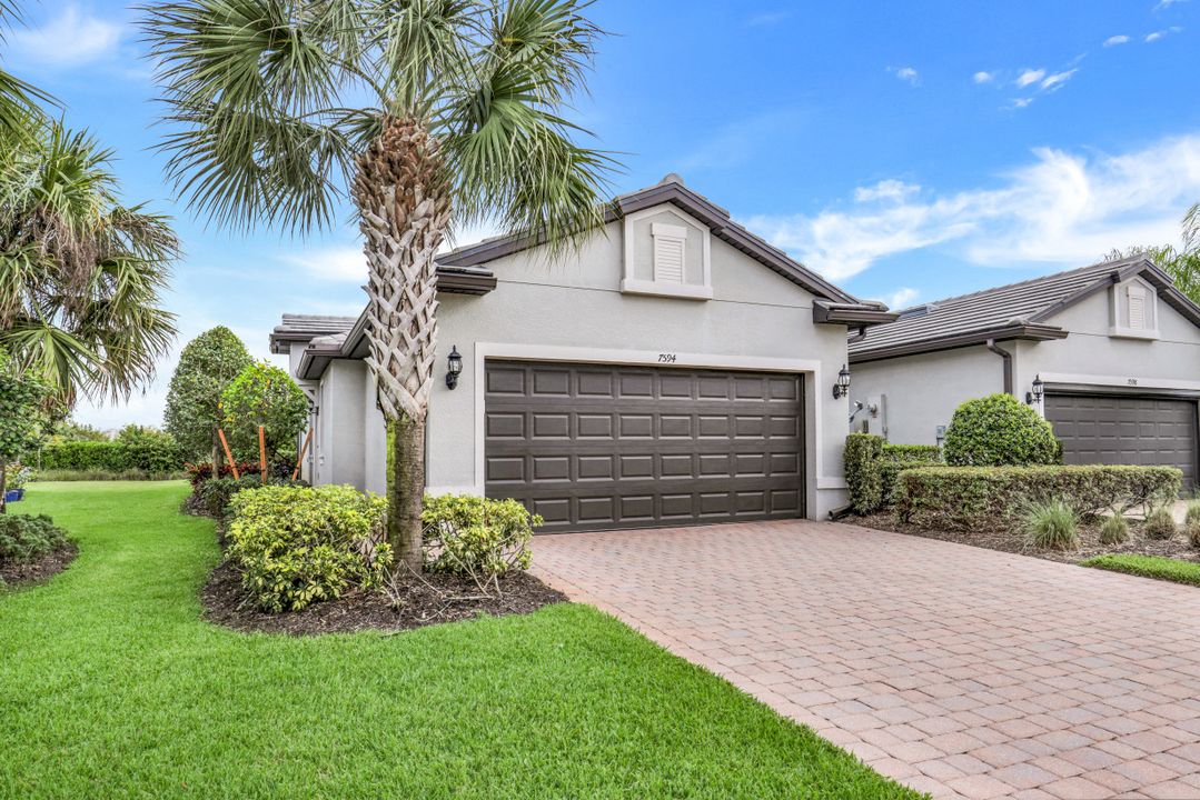 7594 Jacaranda Ln, Naples, FL 34114