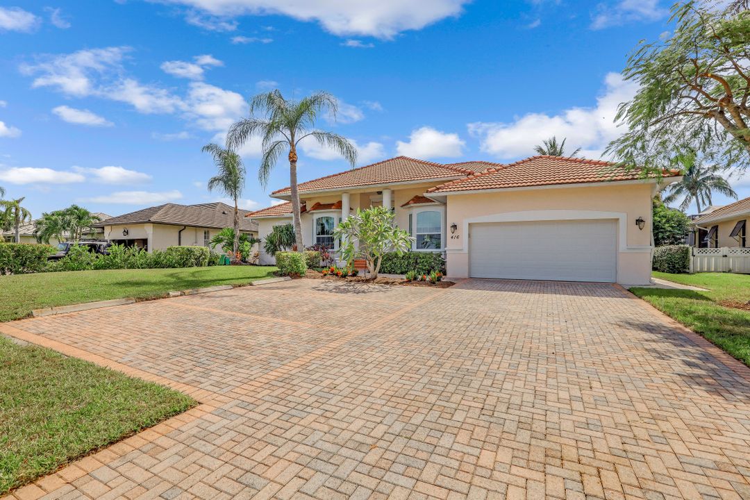 416 Bald Eagle Dr, Marco Island, FL 34145