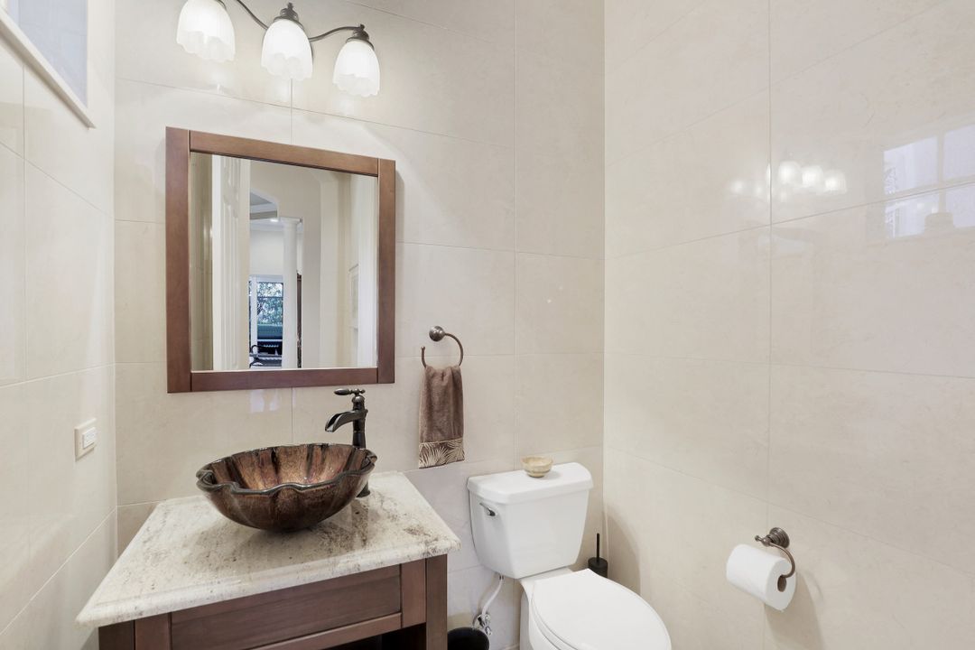 8806 Spinner Cove Ln, Naples, FL 34120