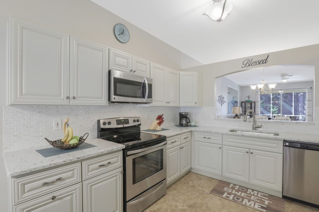 7782 Berkshire Pines Dr, Naples, FL 34104