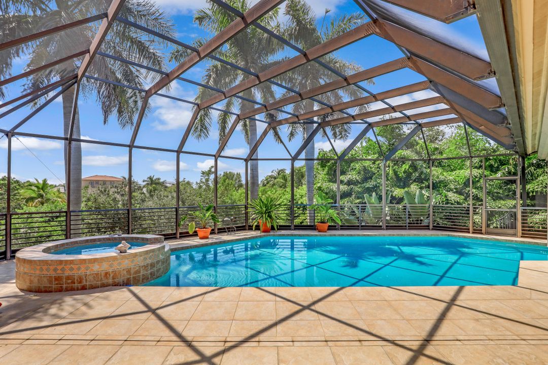 320 Wild Orchid Ln, Marco Island, FL 34145