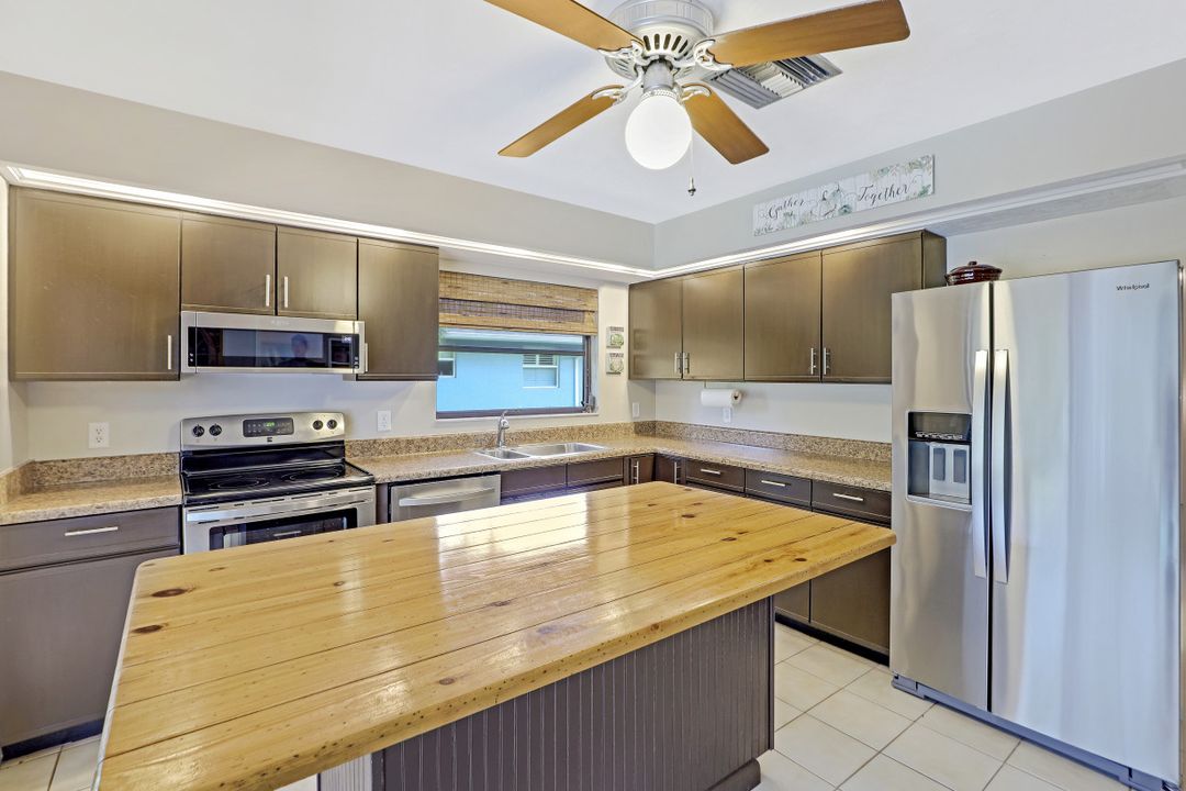 5890 Cypress Hollow Way, Naples, FL 34109