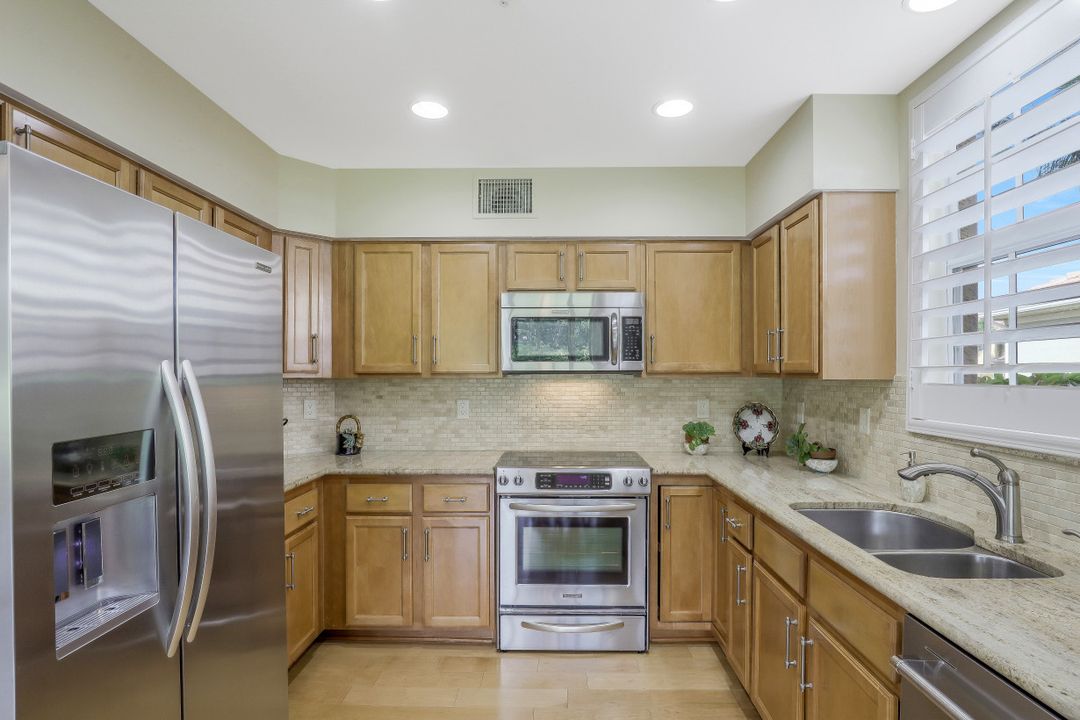 1615 Winding Oaks Way #101, Naples, FL 34109