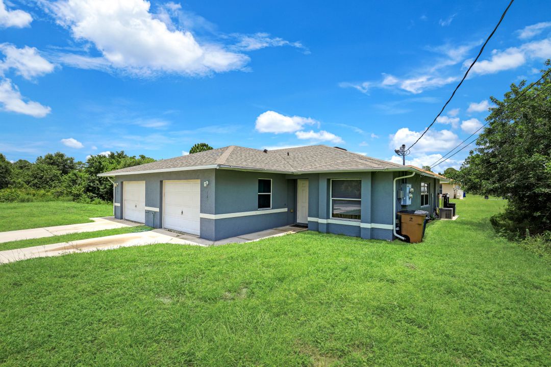 105 Harold Ave S #105 & 107, Lehigh Acres, FL 33973