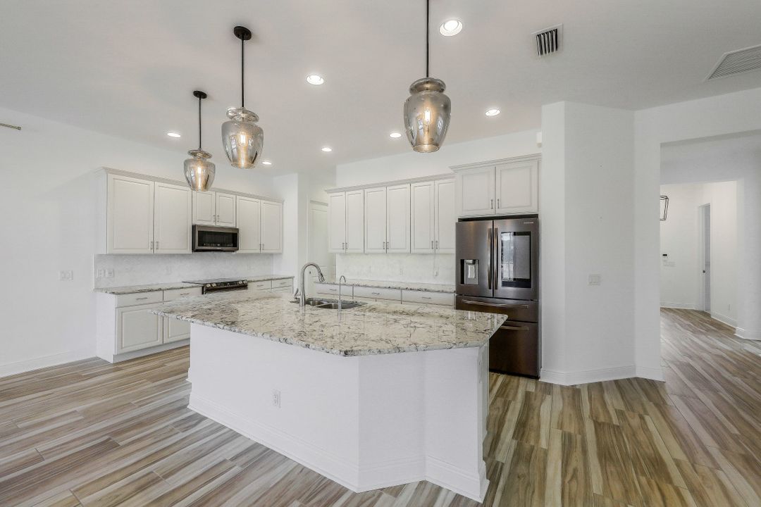 4098 Raffia Dr, Naples, FL 34119