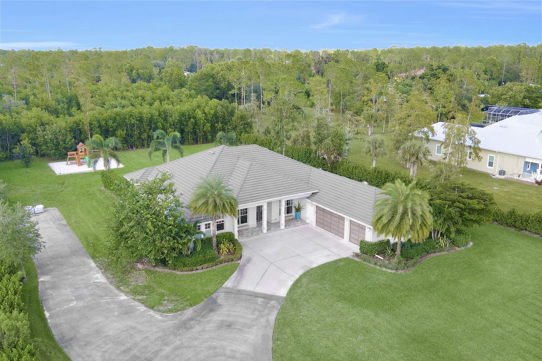 5931 Spanish Oaks Ln, Naples, FL 34119