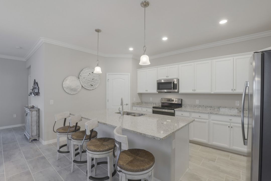 1493 Artesia Dr W, Naples, FL 34113