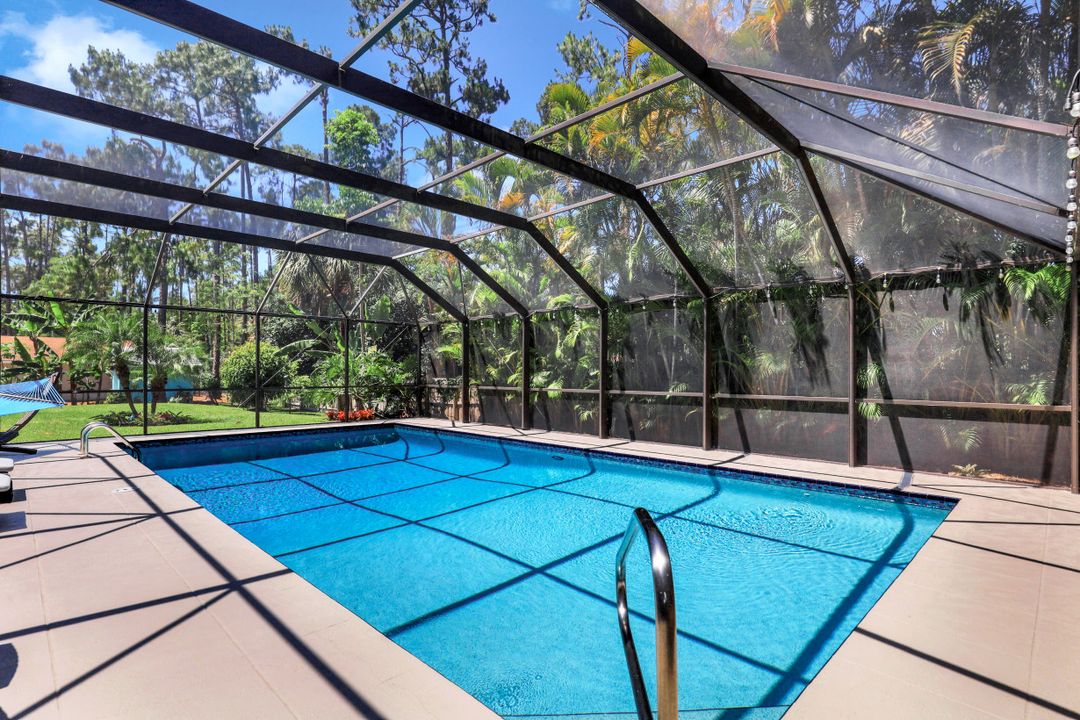 6060 Autumn Oaks Ln, Naples, FL 34119