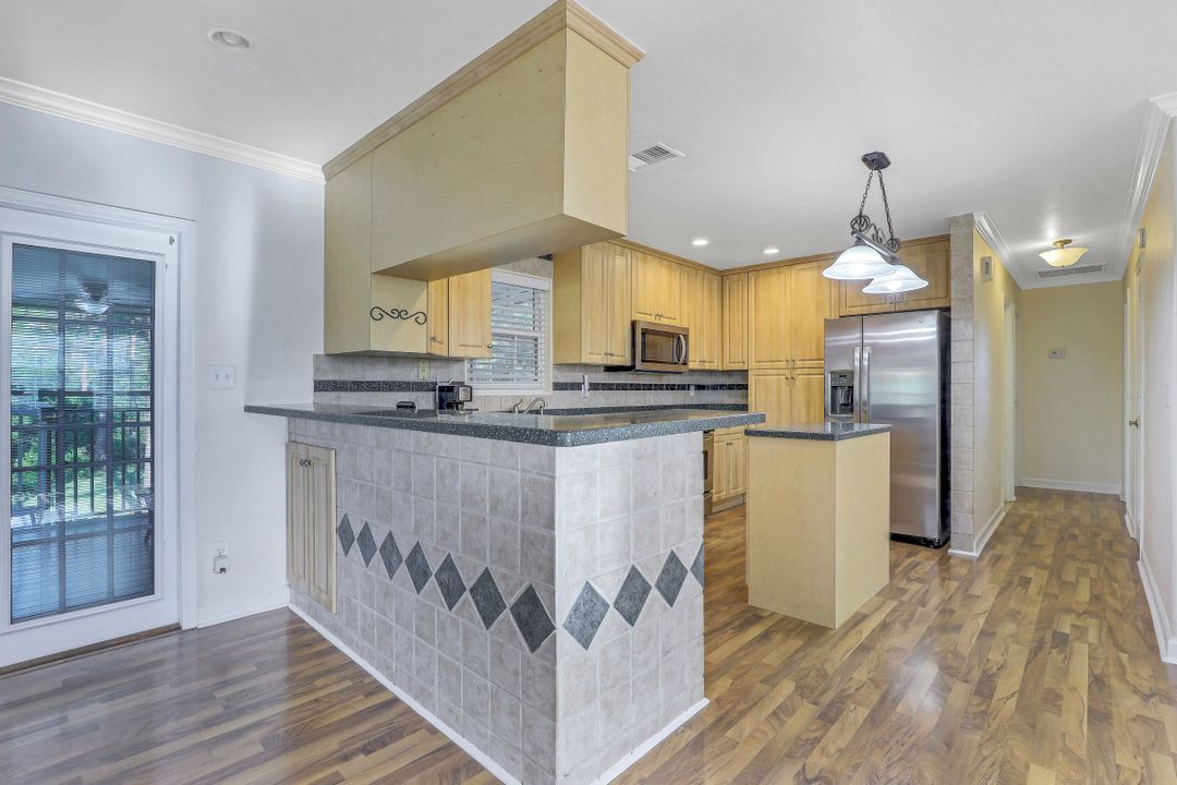 8642 Whispering Pines Dr, Saint James City, FL 33956