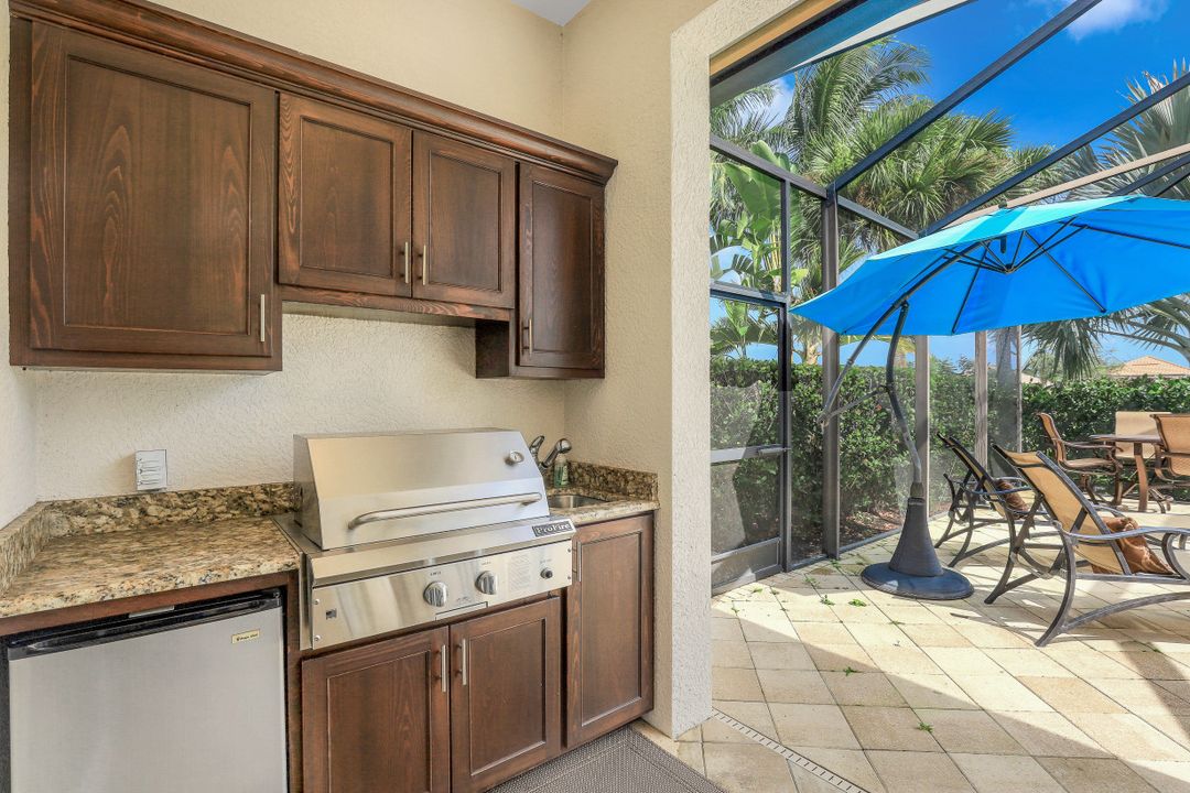 9403 Copper Rock Ct, Naples, FL 34120