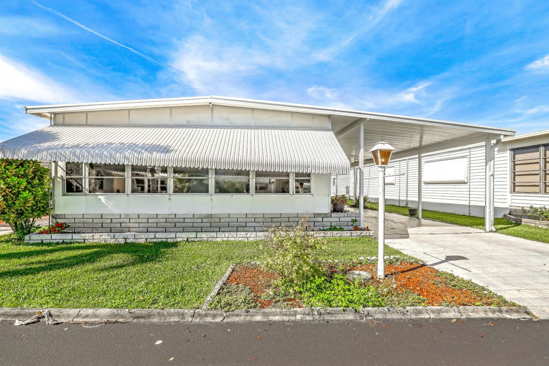 56 Palos Dr, Naples, FL 34104