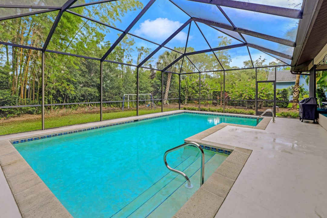 5890 Cypress Hollow Way, Naples, FL 34109