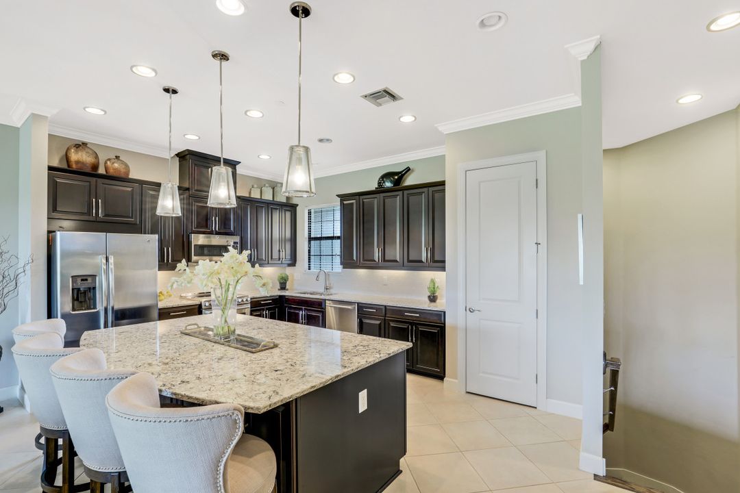 8761 Bellano Ct #203, Naples, FL 34119