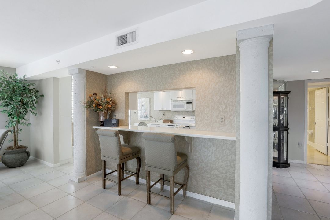 21 Bluebill Ave #404, Naples, FL 34108