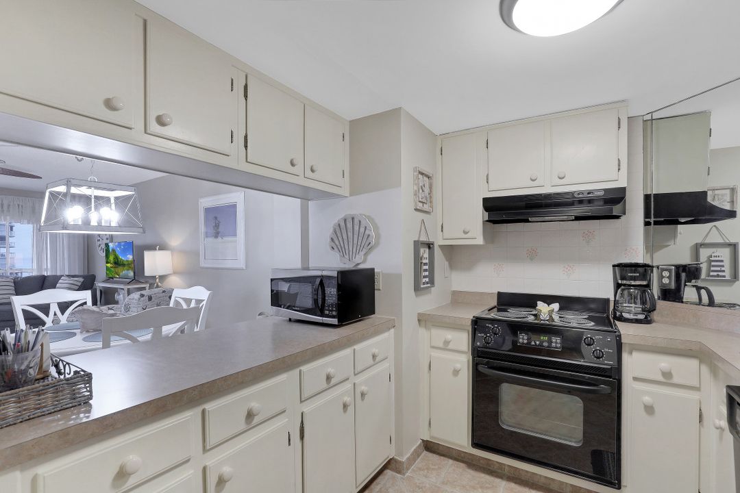 1 Bluebill Ave, Naples, FL 34108