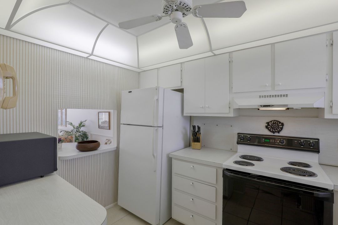 200 Forest Lakes Blvd #203, Naples, FL 34105