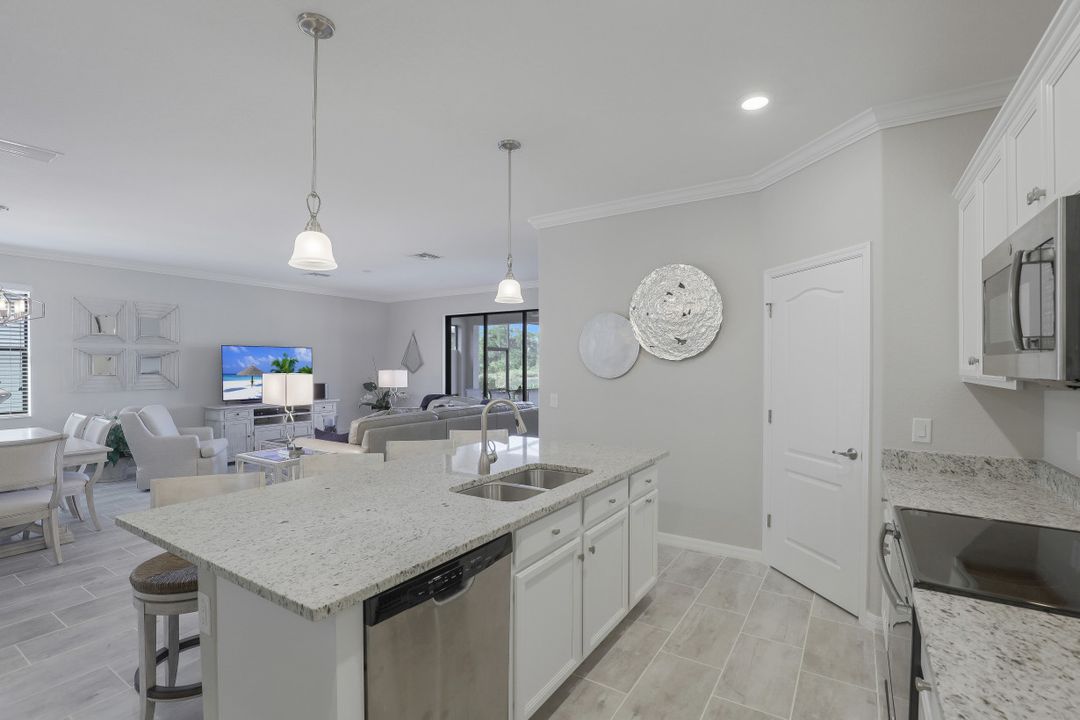 1493 Artesia Dr W, Naples, FL 34113