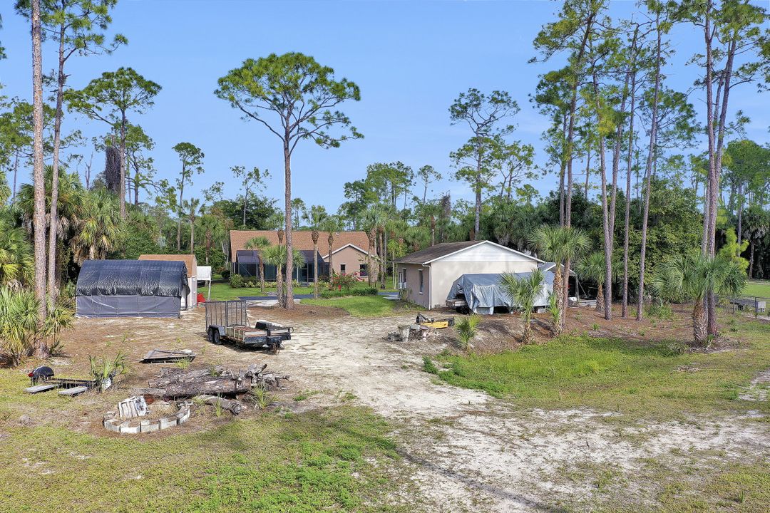 5980 Hidden Oaks Ln, Naples, FL 34119