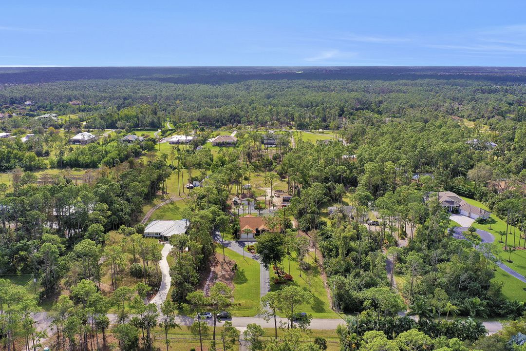 5980 Hidden Oaks Ln, Naples, FL 34119