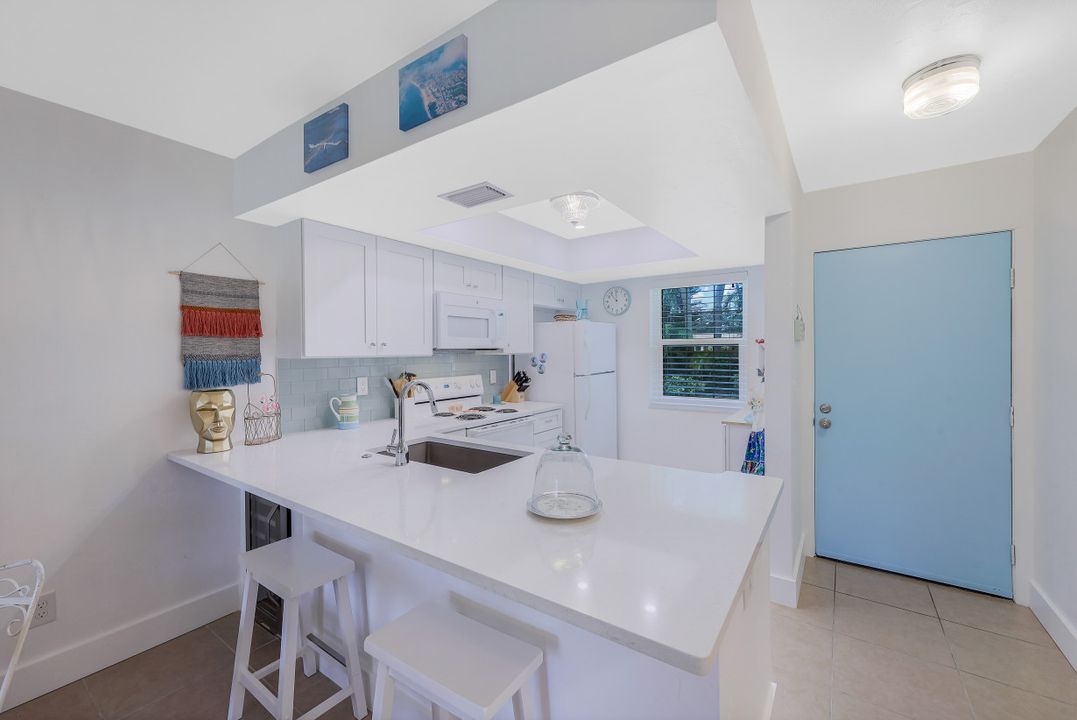 1079 Pine Isle Ln, Naples, FL 34112