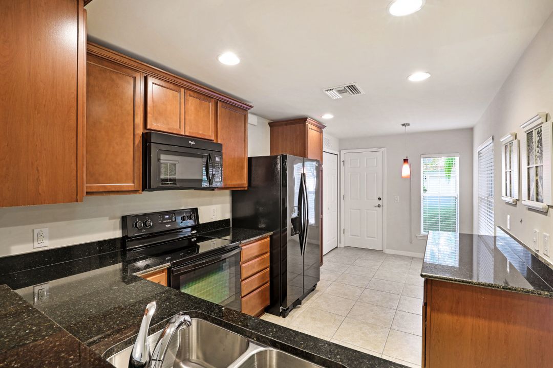 8458 Karina Ct, Naples, FL 34114