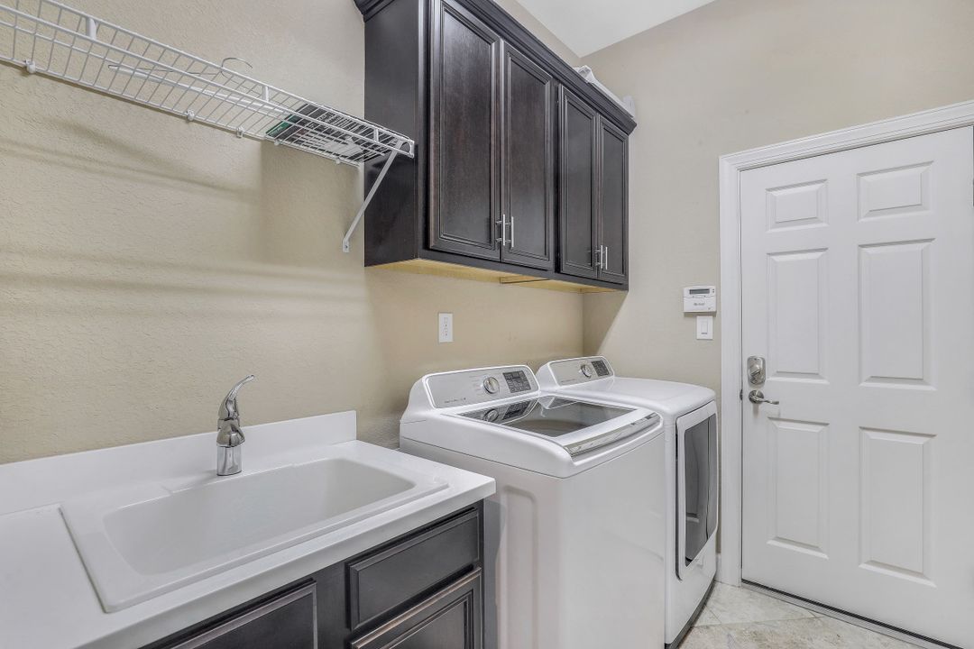 9403 Copper Rock Ct, Naples, FL 34120