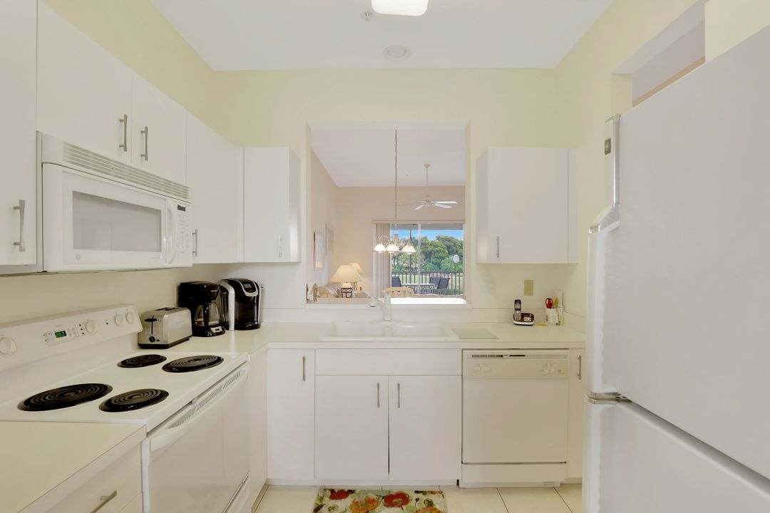 2310 Carrington Ct #202, Naples, FL 34109