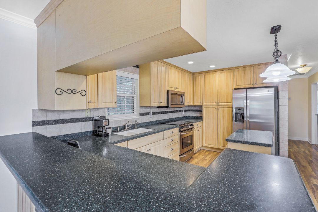 8642 Whispering Pines Dr, Saint James City, FL 33956