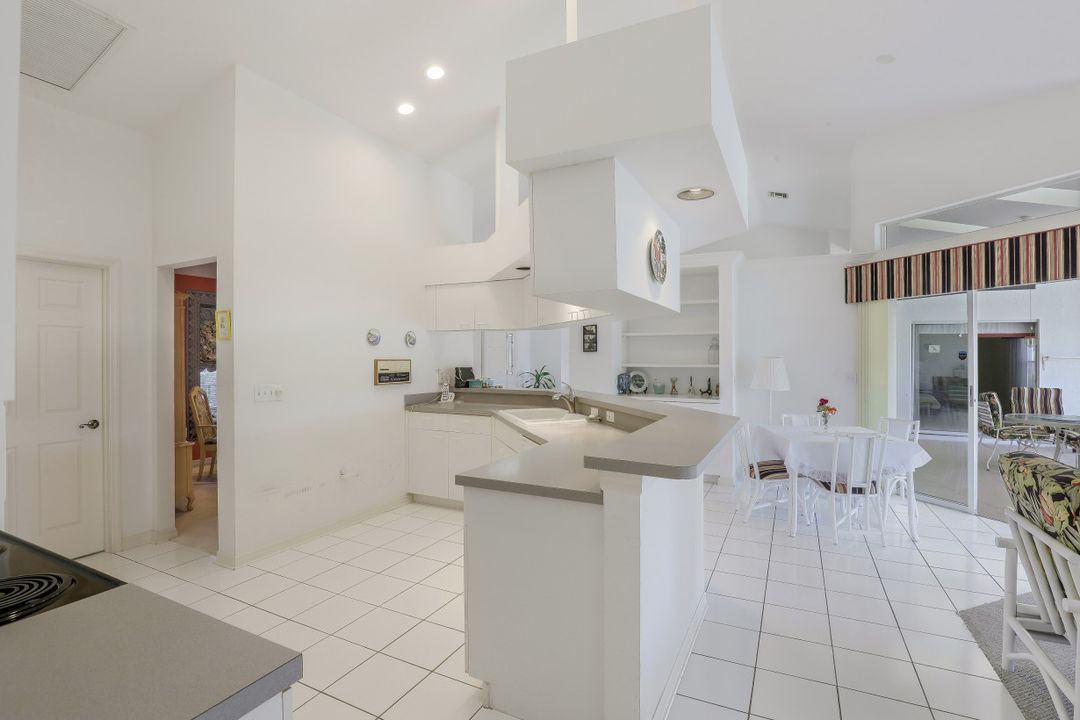 11708 Longshore Way W, Naples, FL 34119