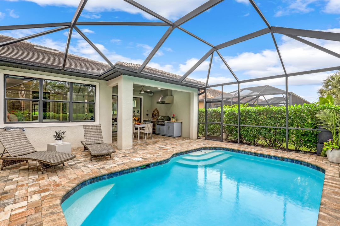 7682 Jacaranda Ln, Naples, FL 34114