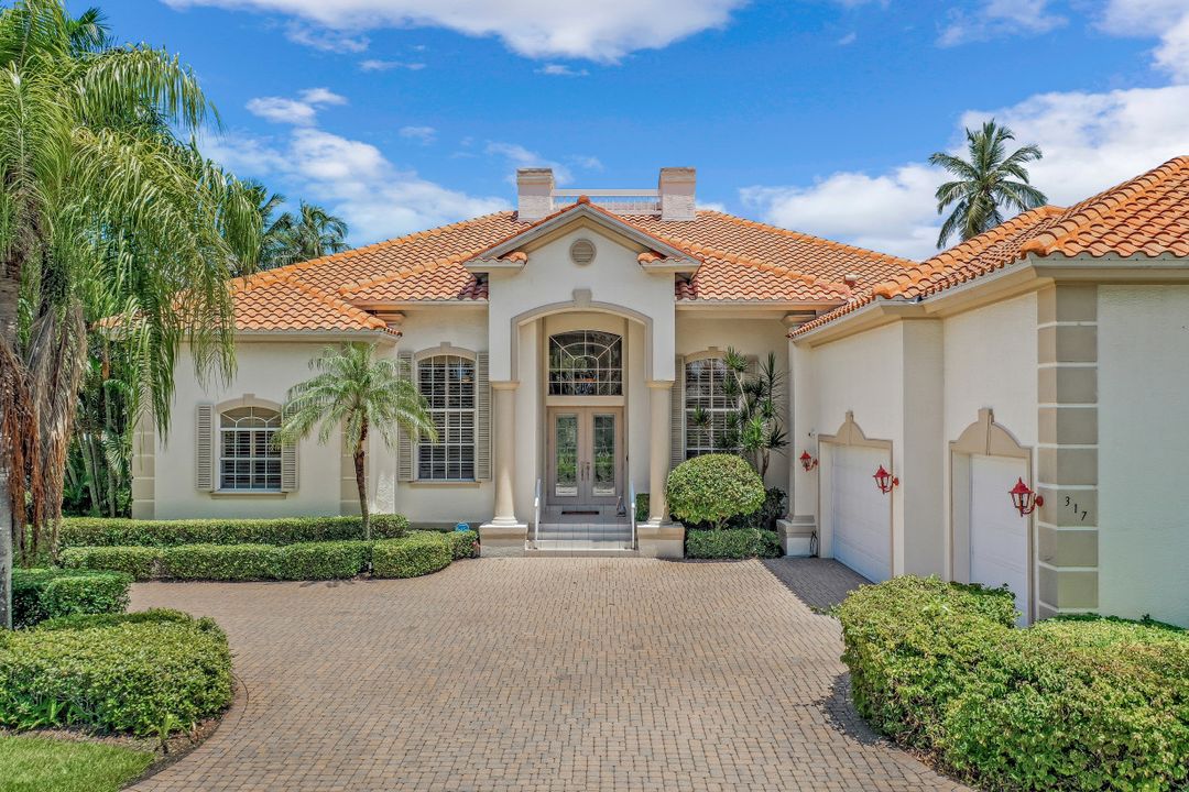 317 Mooring Line Dr, Naples, FL 34102