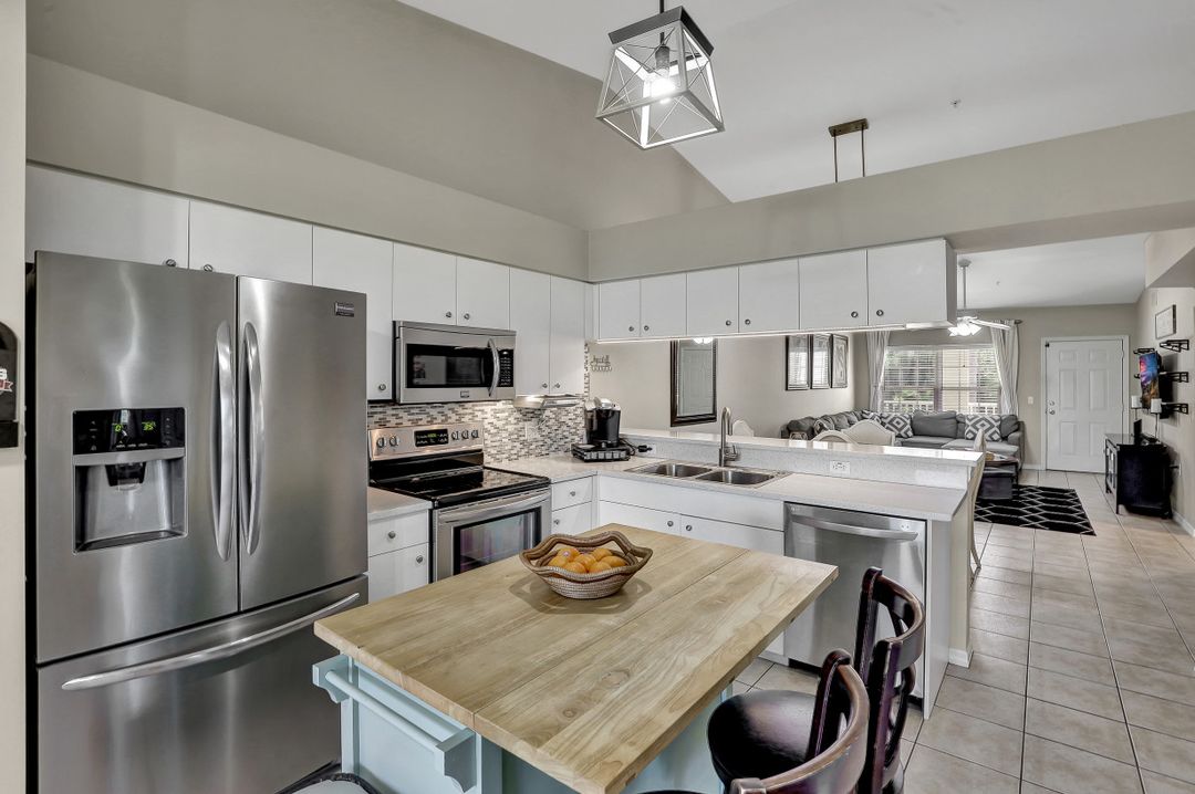 4975 Sandra Bay Dr #203, Naples, FL 34109