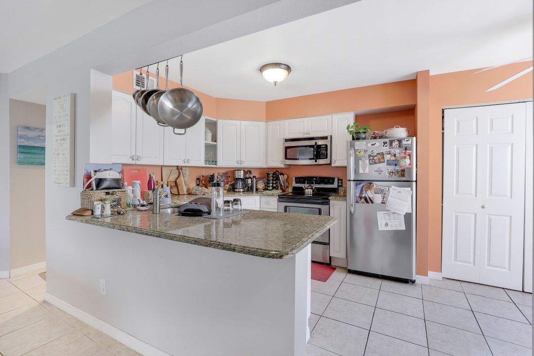 9589 Crescent Garden Dr #101, Naples, FL 34109