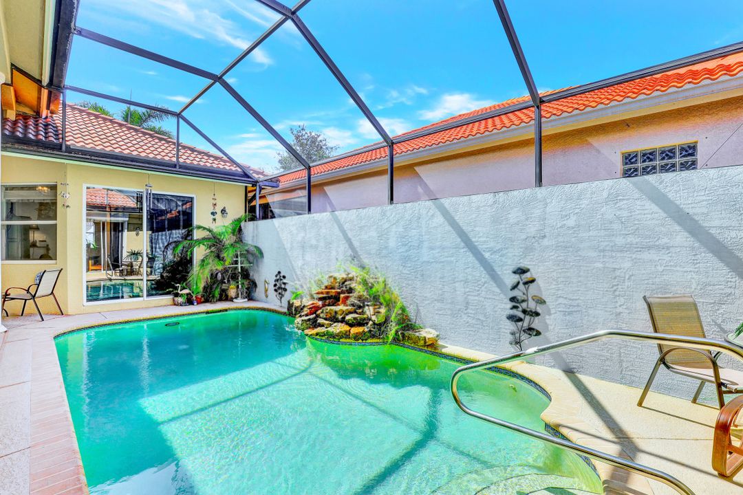 112 April Sound Dr, Naples, FL 34119