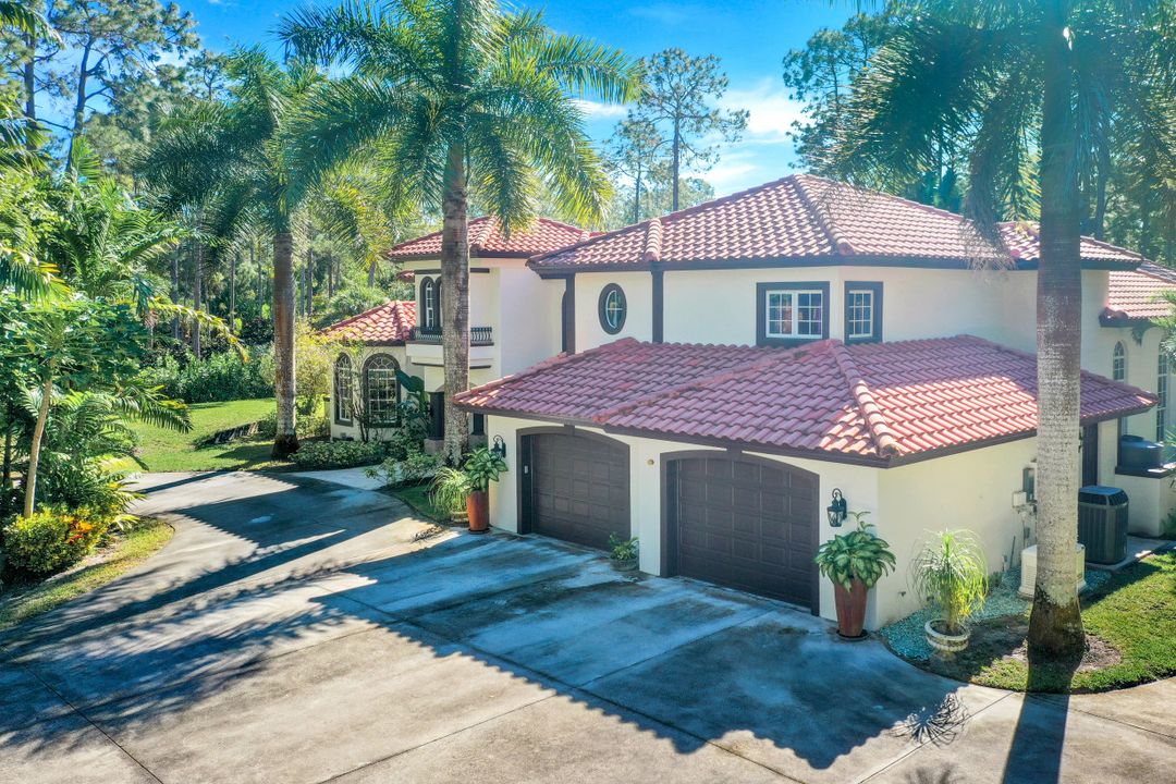 4930 Mahogany Ridge Dr, Naples, FL 34119