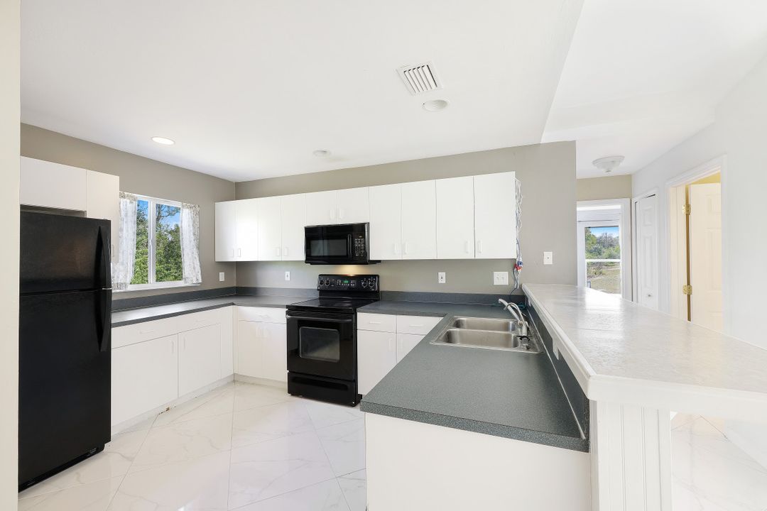 591 Pierre Cir, Lehigh Acres, FL 33974