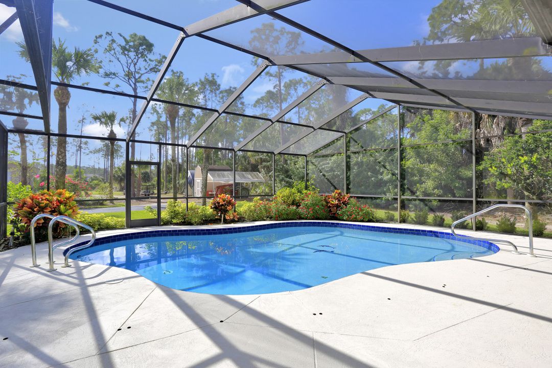 5980 Hidden Oaks Ln, Naples, FL 34119